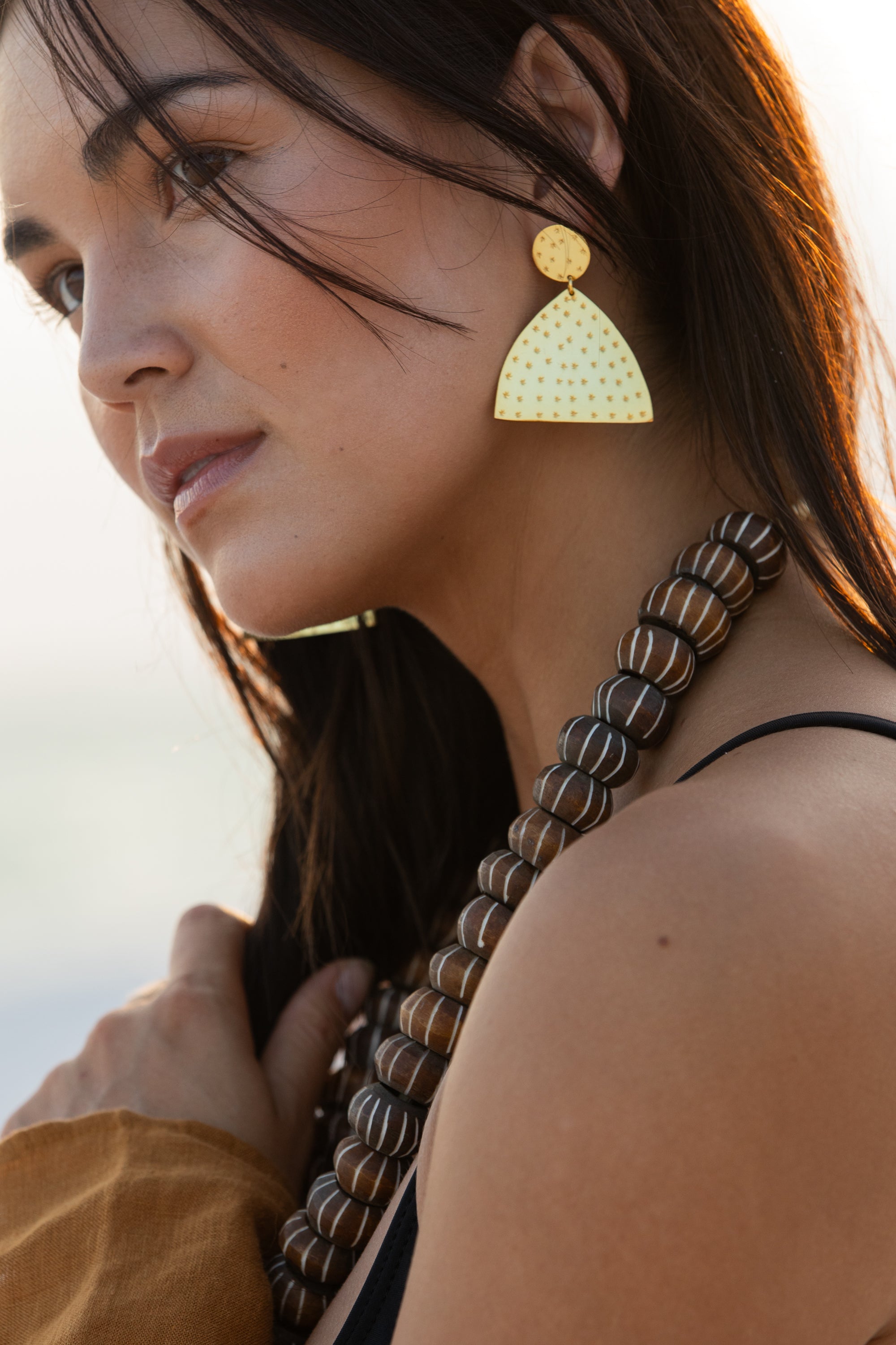 Becasa gold crest earrings