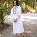 Keepsake Shirt Dress in White — European linen shirt dress with mother of pearl buttons and shirttail hem