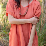 Amelia Mini Dress in Sea Fan Coral — European linen mini dress with soft V neckline and at-elbow sleeves