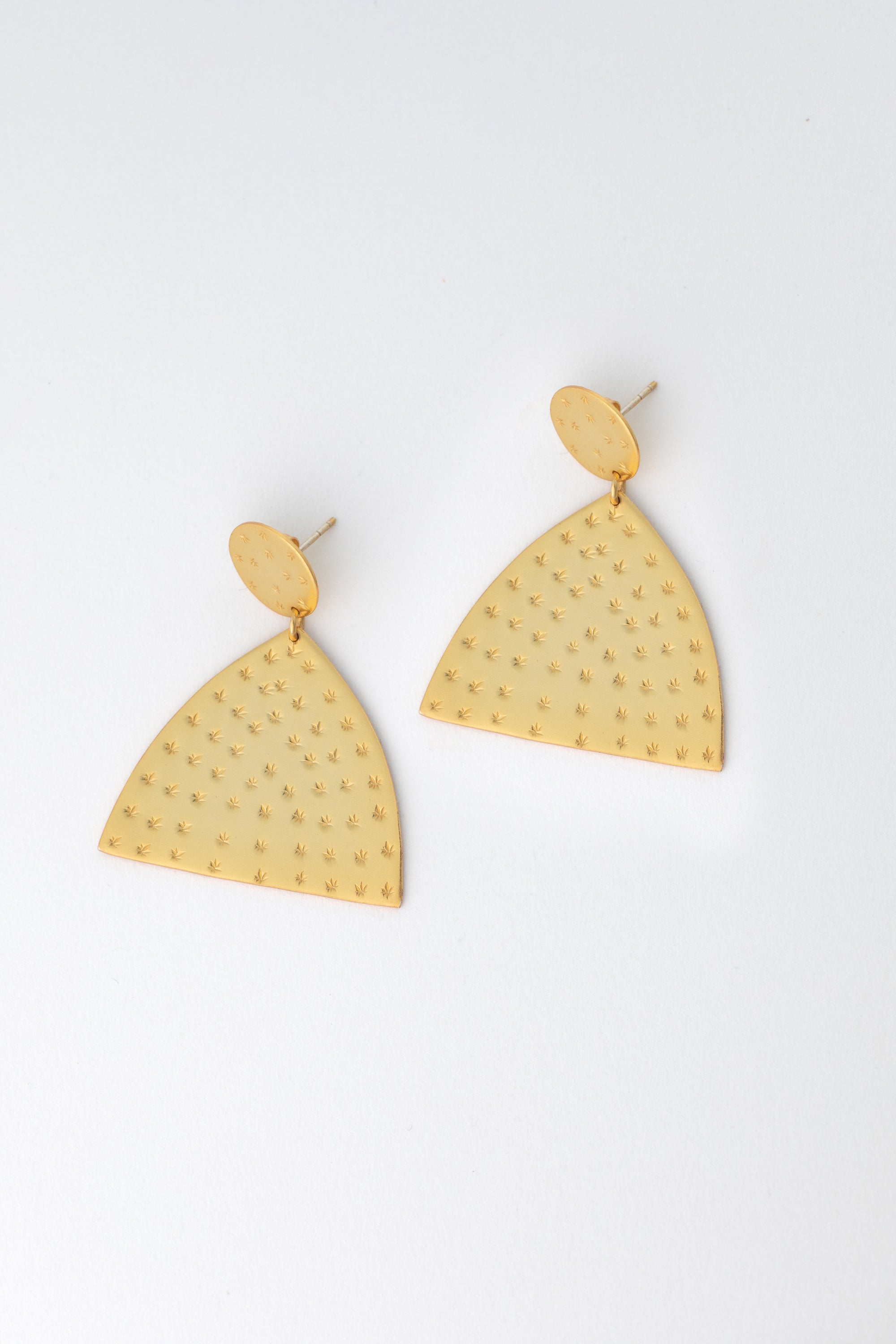 gold crest earrings